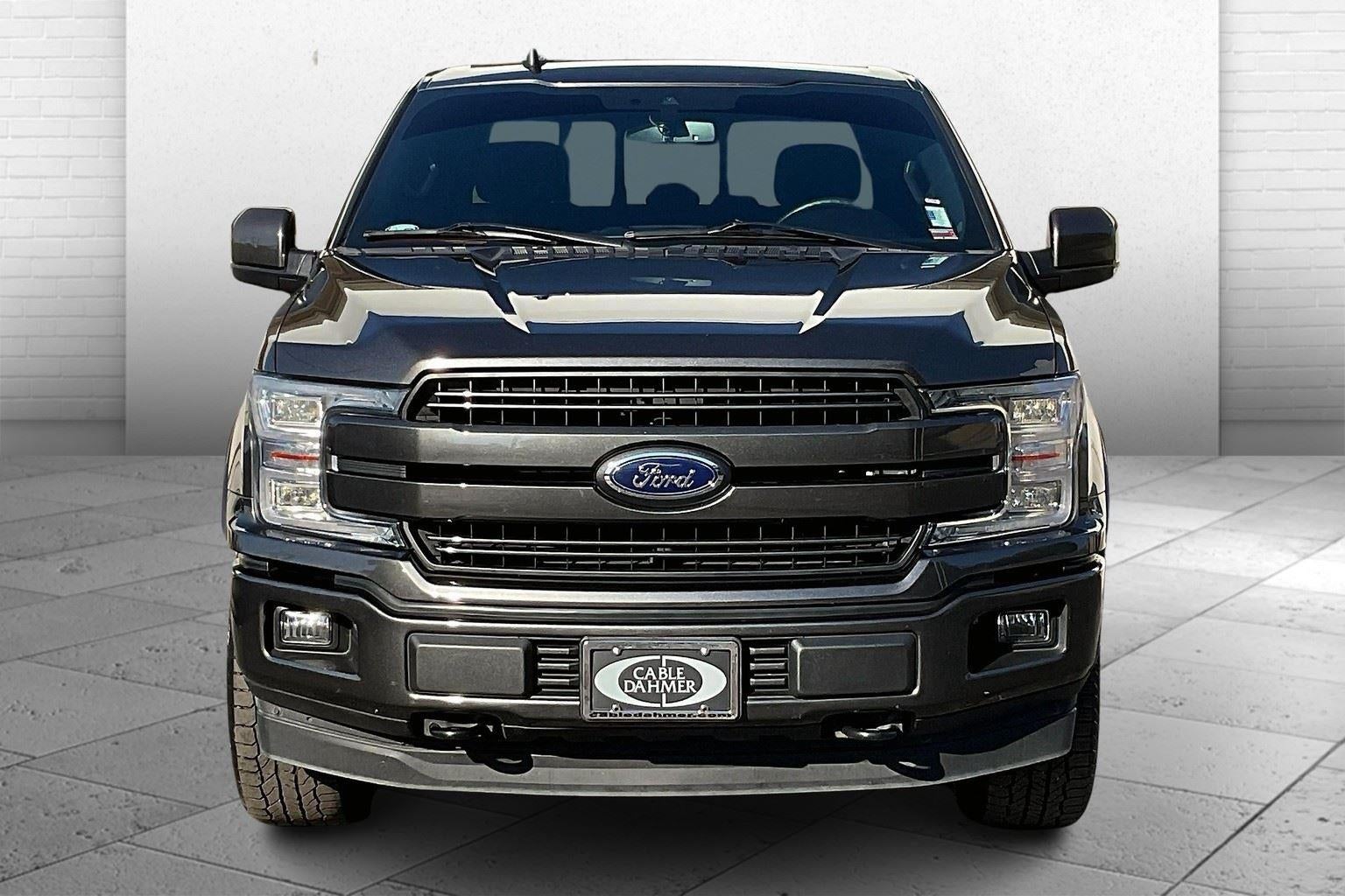 Used 2019 Ford F-150 Lariat with VIN 1FTEW1E54KKE91694 for sale in Kansas City